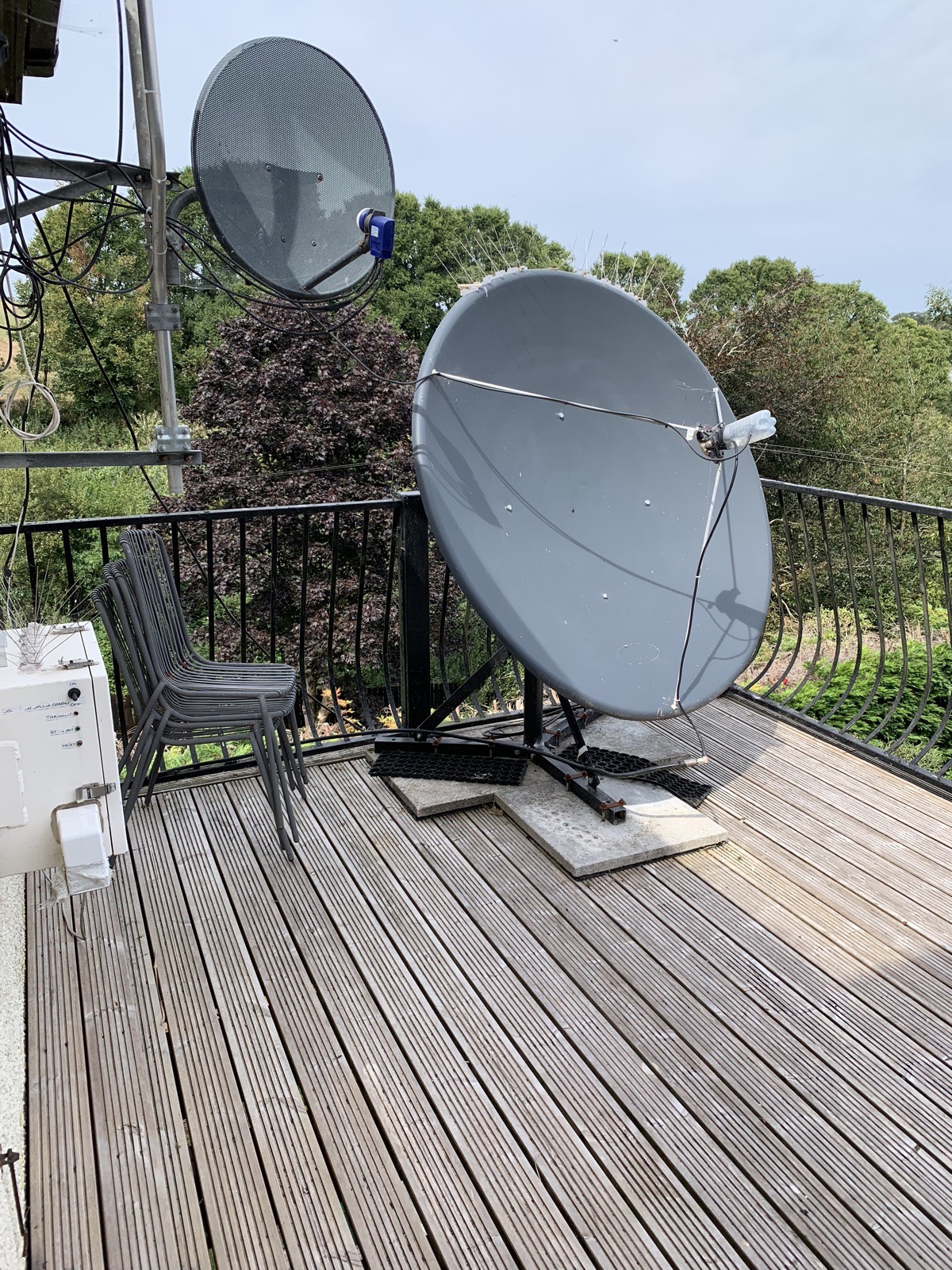 The dish and feed used for QO-100, with the equipment box below