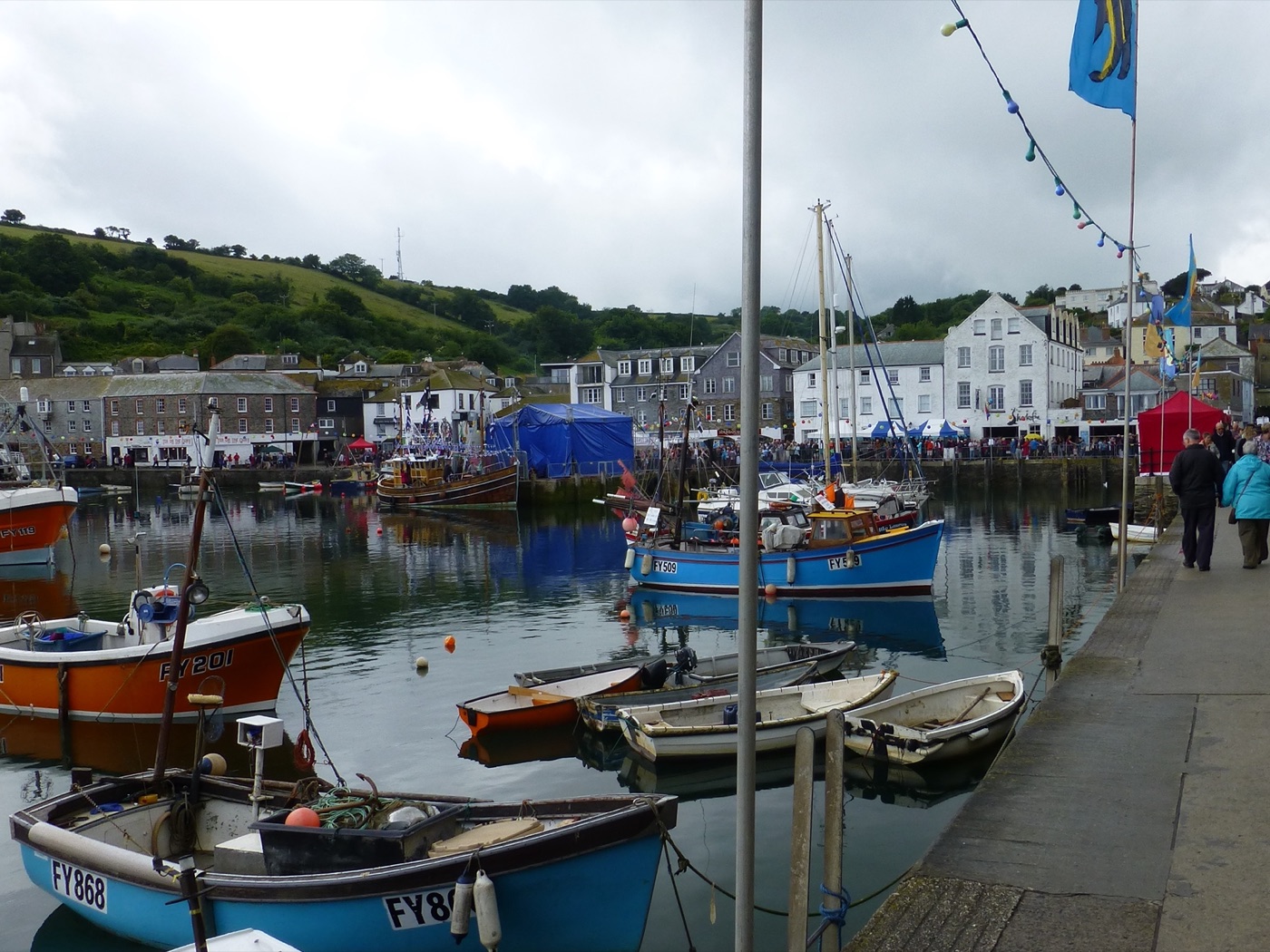 Mevagissey harbour, boats and bunting during Feast Week